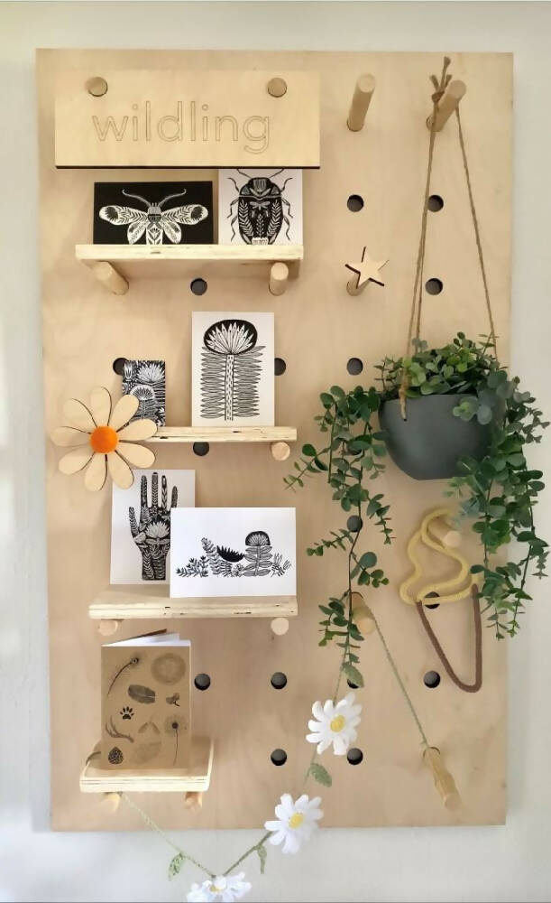 The Tall Peg Board